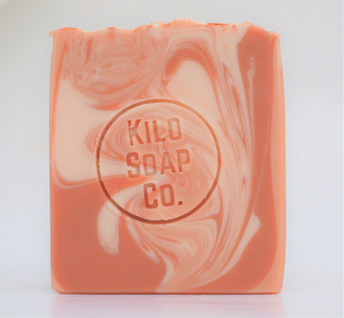 Elegant soap bar with rose and gold hues, scented with rose geranium and ylang-ylang. made in Spain with luxury skincare oils and butters.