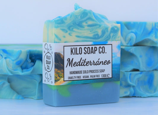Mediterranean-inspired soap bar with blue and green swirls, scented with tropical notes. Made in Spain with luxury olive oil.
